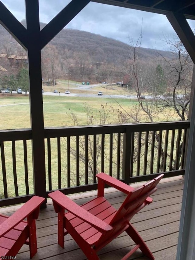 deck featuring a mountain view