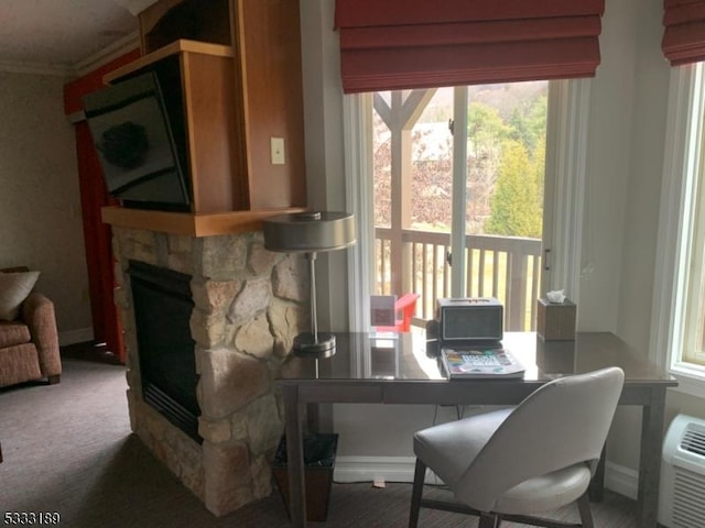 carpeted living room with a fireplace