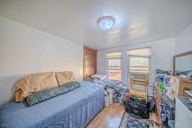 bedroom featuring hardwood / wood-style flooring