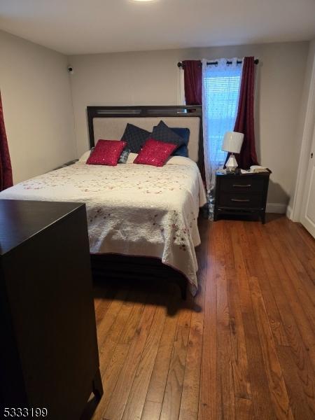 bedroom featuring hardwood / wood-style floors