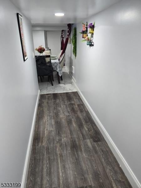 corridor featuring hardwood / wood-style flooring