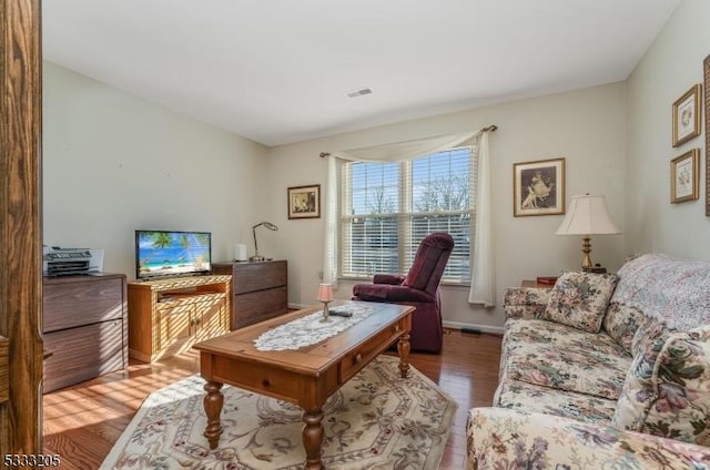 living room with hardwood / wood-style flooring