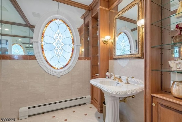 bathroom with tile walls, baseboard heating, tile patterned floors, and ornamental molding