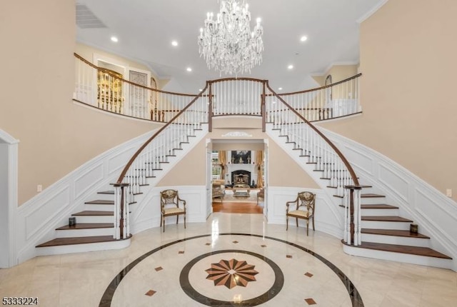 foyer entrance with a notable chandelier