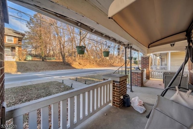 view of patio featuring a porch