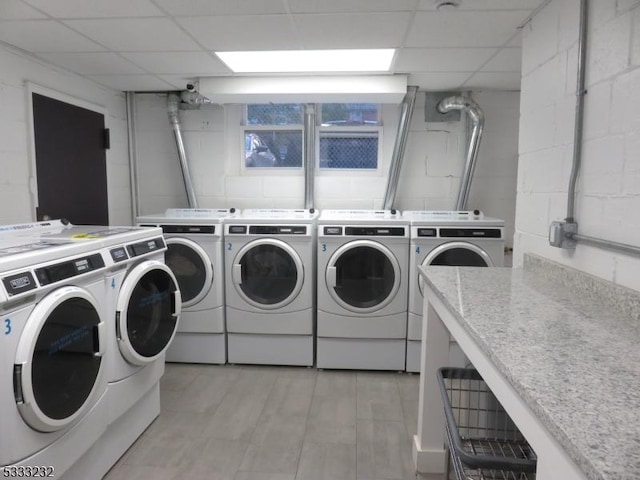 washroom featuring washer and dryer