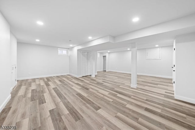 basement with light wood-type flooring