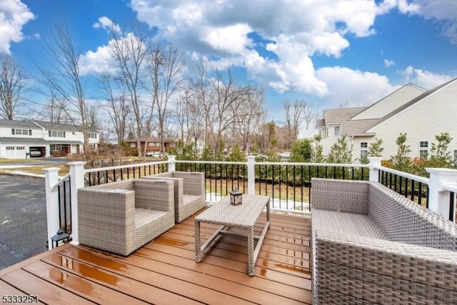 wooden deck featuring an outdoor living space