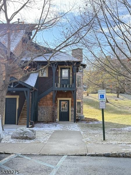 view of front of home featuring central AC unit