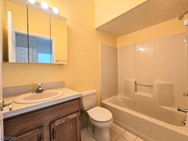 full bathroom with shower / tub combination, toilet, tile patterned floors, and vanity