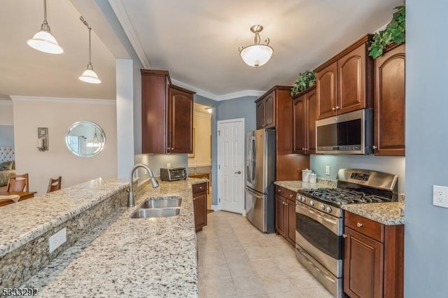 kitchen featuring pendant lighting, sink, crown molding, appliances with stainless steel finishes, and light stone counters