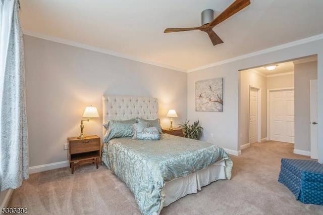 bedroom featuring ceiling fan, carpet, and crown molding