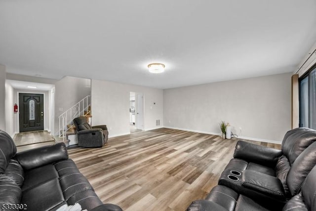 living room with hardwood / wood-style flooring