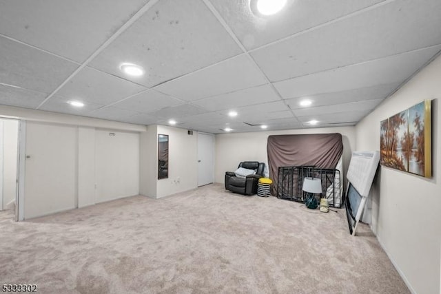 living area with light carpet