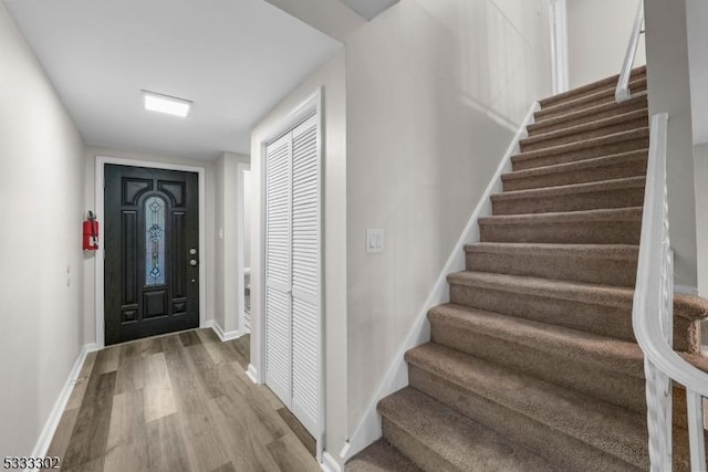 foyer entrance featuring hardwood / wood-style flooring