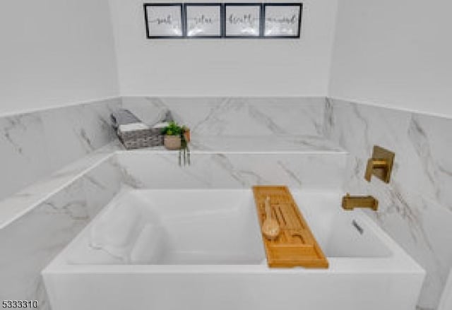 bathroom featuring a bathtub