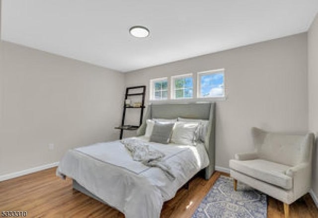 bedroom featuring hardwood / wood-style floors