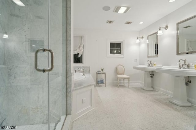 bathroom with a shower with shower door