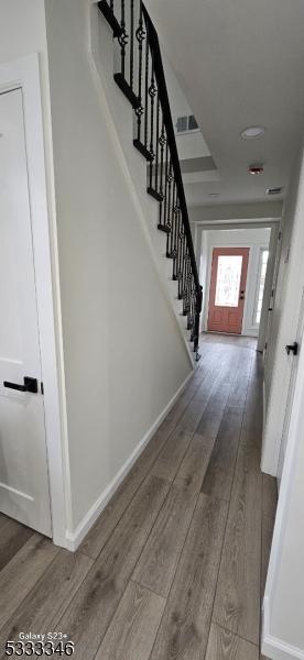 interior space with hardwood / wood-style floors