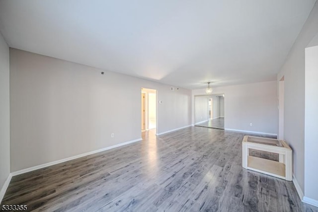 unfurnished room featuring wood-type flooring