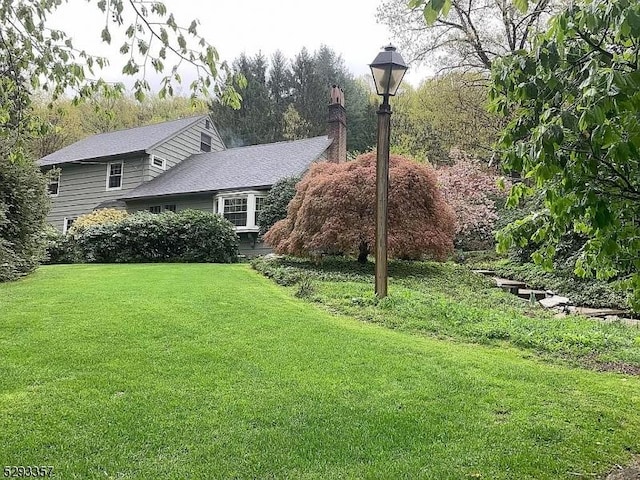 exterior space featuring a front lawn