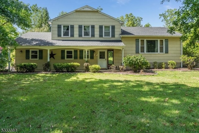 split level home featuring a front yard