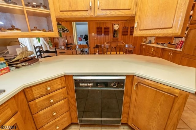4 Webster Rd, Franklin Twp, NJ 08873 - kitchen featuring black dishwasher, light tile patterned floors, light countertops, and brown cabinets