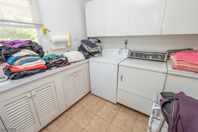 4 Webster Rd, Franklin Twp, NJ 08873 - laundry area with washer and clothes dryer, cabinet space, and light tile patterned floors