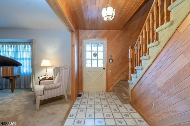 4 Webster Rd, Franklin Twp, NJ 08873 - doorway featuring healthy amount of natural light, stairs, wood walls, a chandelier, and wooden ceiling