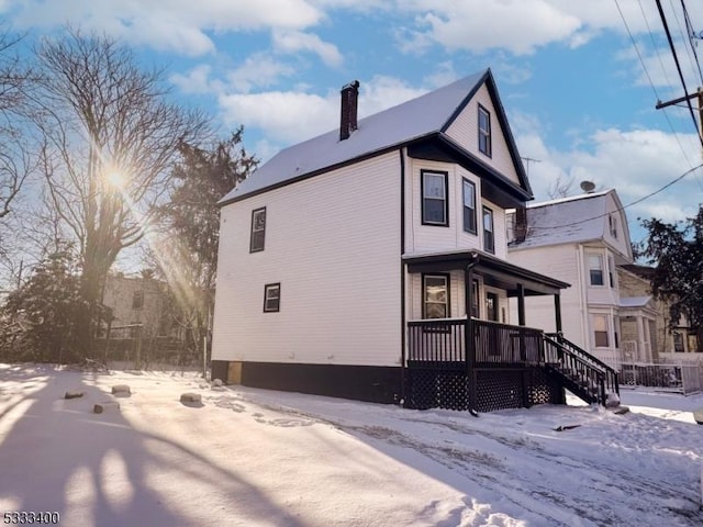 view of snow covered property