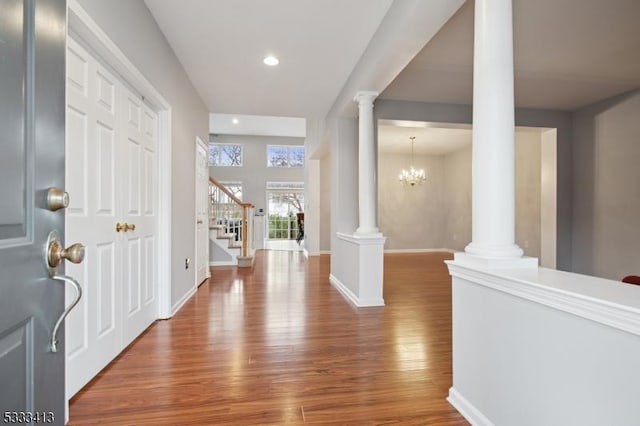 30 Stirrup Ln, Raritan Twp, NJ 08822 - foyer entrance with recessed lighting, wood finished floors, stairs, baseboards, and ornate columns