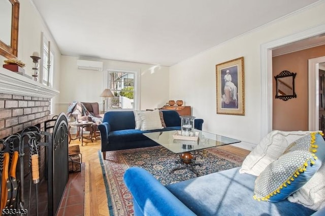 living room with crown molding, a brick fireplace, and an AC wall unit