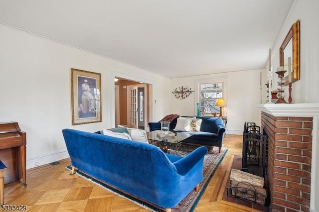 living room with light parquet floors and a brick fireplace