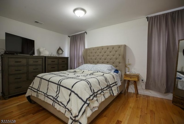 bedroom featuring light wood-type flooring