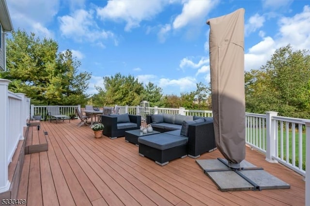 deck featuring outdoor lounge area