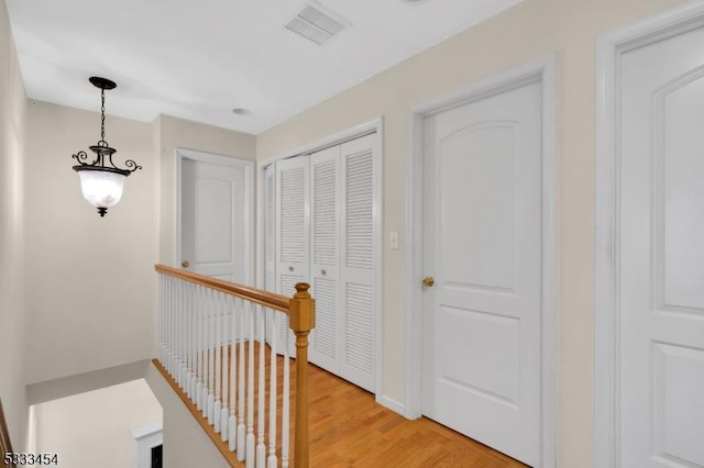 corridor featuring light hardwood / wood-style flooring