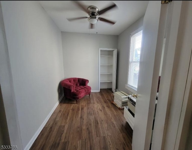 unfurnished room with ceiling fan and dark hardwood / wood-style flooring