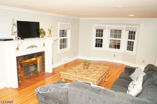 living room with ornamental molding and wood-type flooring