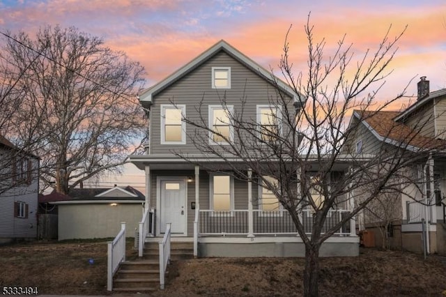 front of property featuring a porch