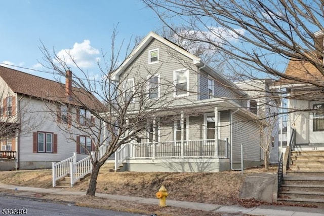 front of property featuring a porch