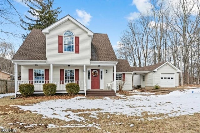 view of front of property featuring a garage and covered porch