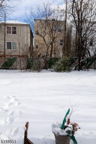 view of yard covered in snow