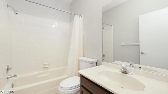 full bathroom with vanity, toilet, and shower / bathtub combination with curtain