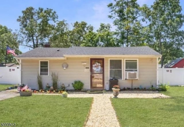 view of front of property with a front lawn