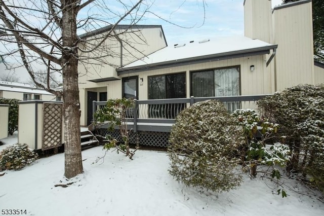 view of snow covered property