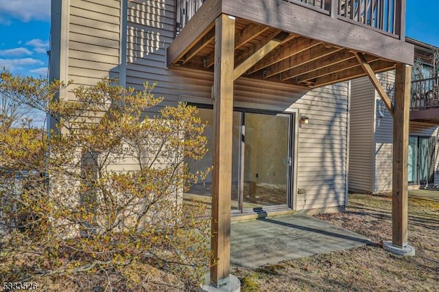 property entrance featuring a patio