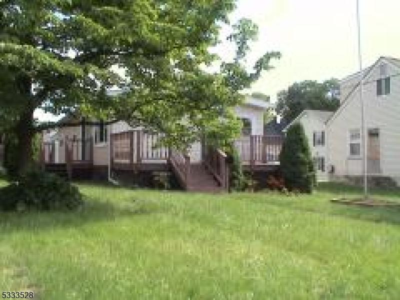 view of yard with a wooden deck