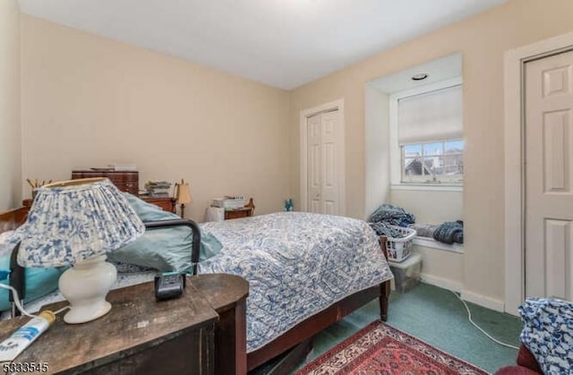 bedroom featuring carpet