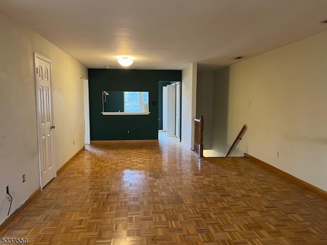 spare room with light parquet flooring