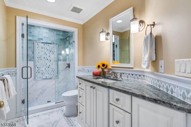 bathroom with toilet, walk in shower, tile walls, crown molding, and vanity